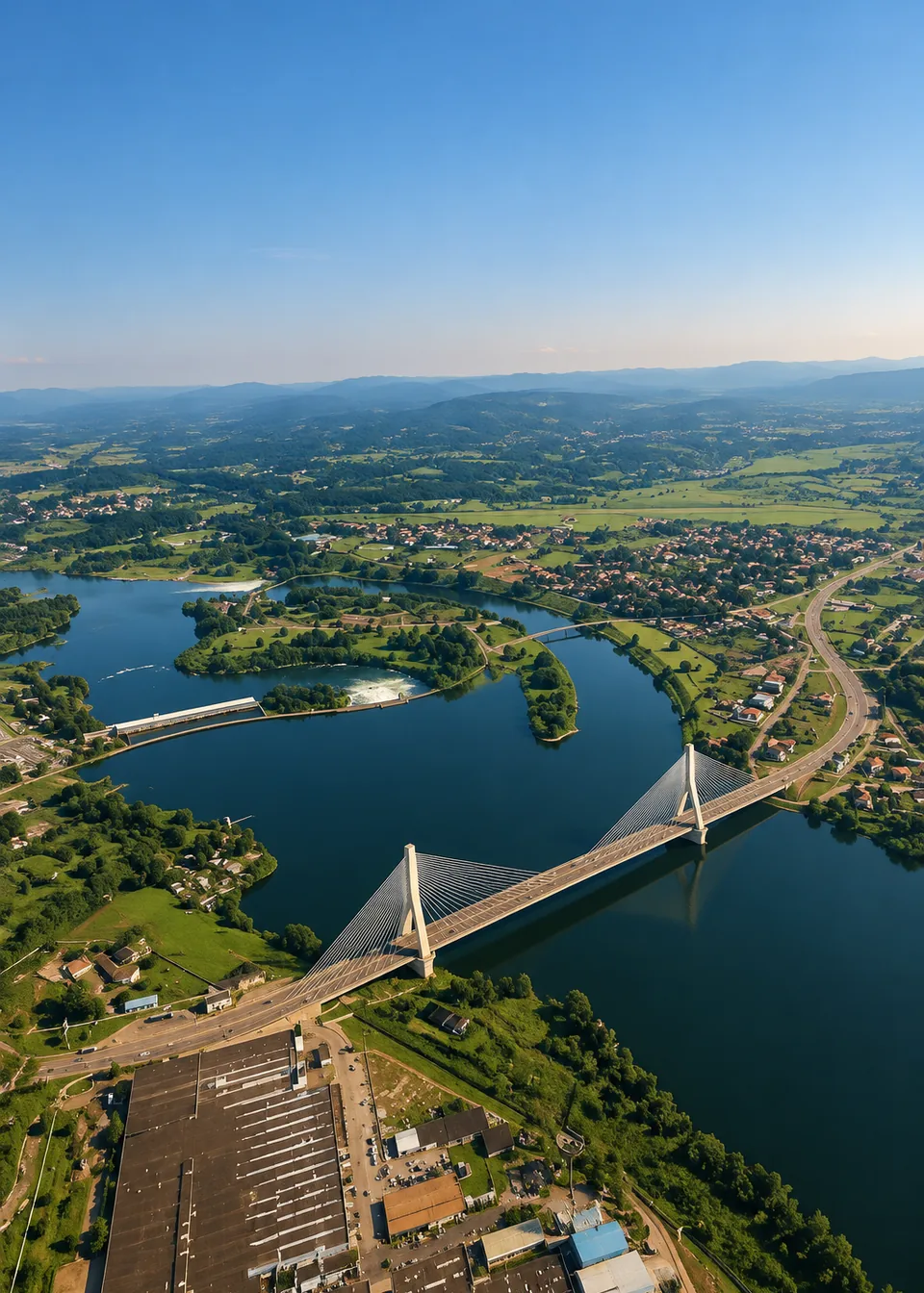 Aerial view of river islands and a bridge in Jinja